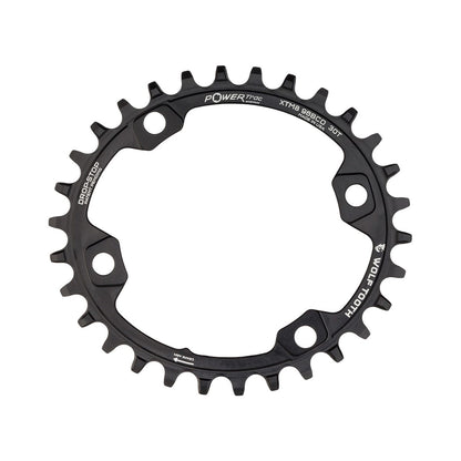 Plateau Mono Oval WOLF TOOTH ELLIPTICAL 96 BCD 11V Shimano XT M8000/SLX M7000 4 Trous 96mm Noir — vue du plateau sur fond blanc