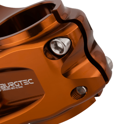 Potence BURGTEC ENDURO MK3 Bronze — détail du serrage du pivot