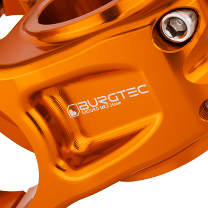 Potence BURGTEC ENDURO MK3 Orange — détail du corps usiné