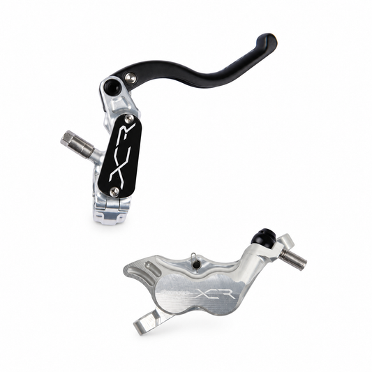 Frein HOPE XCR PRO E4 PM Argent — levier et étrier sur fond blanc